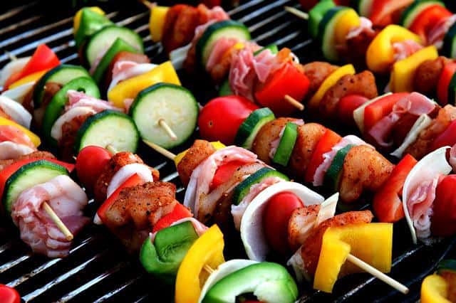meat and veggies shish-kebab on grill